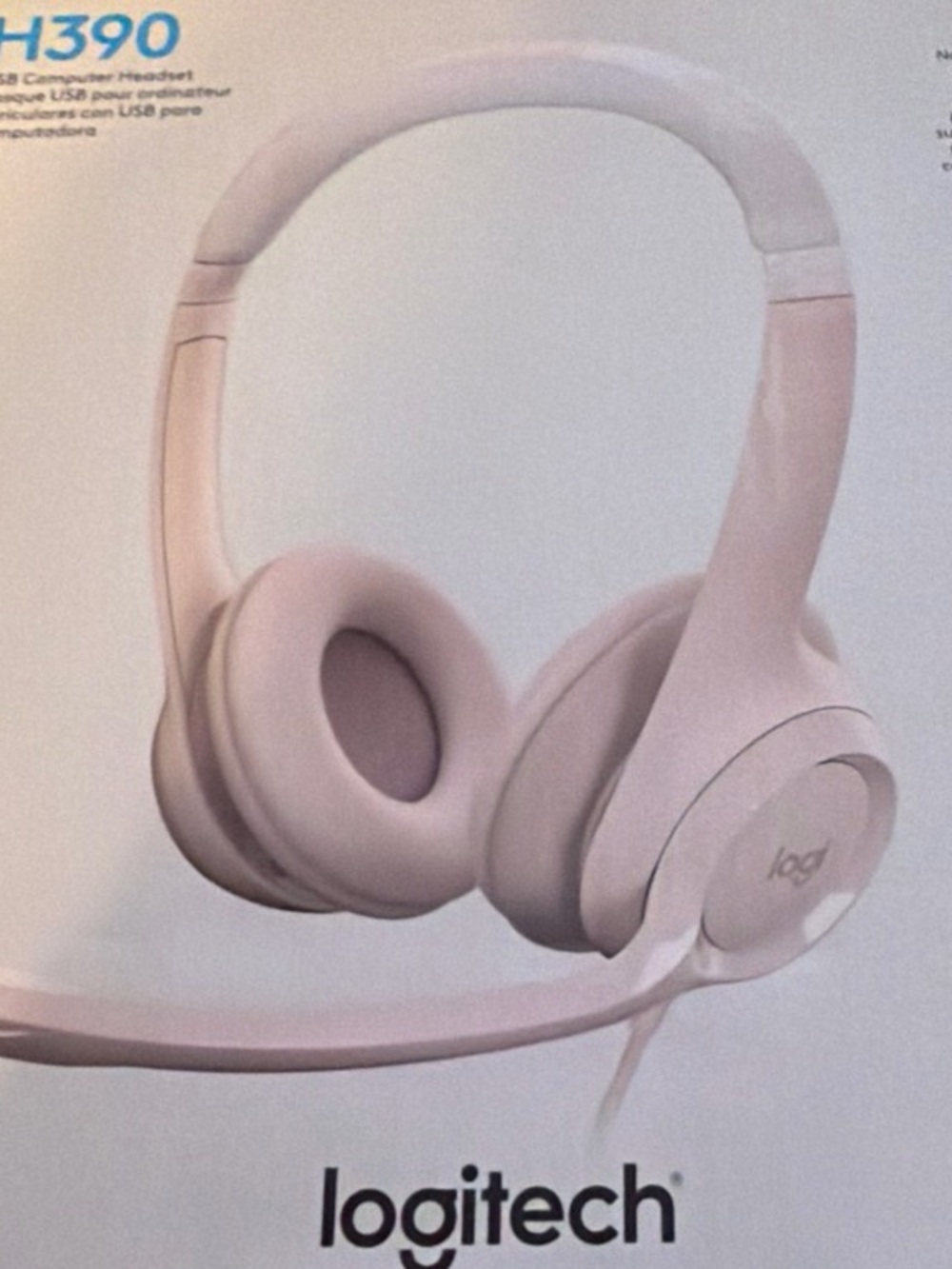 Logitech H390 Wired Over-Ear Headset in Light Pink and White